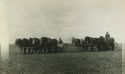 Fred Griesinger (on left) seeding wheat